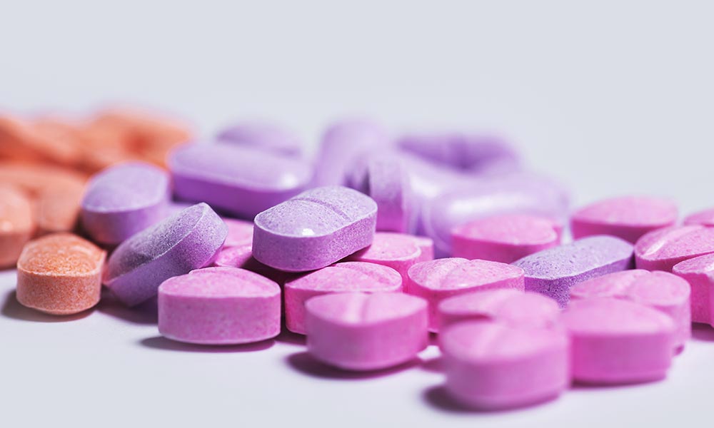 MDMA, acts like amphetamines and has psychedelic properties, producing feelings of increased energy, pleasure, emotional warmth, and distorted visual and time perceptions